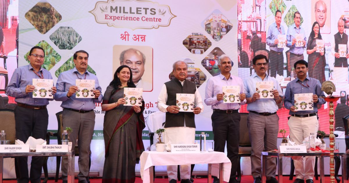 Shri Narendra Singh Tomar, Hon’ble Union Minister, MoA&FW, releasing "The Story of Millets Experience Centre and Millets (Shree Anna)" during the inaugural ceremony.