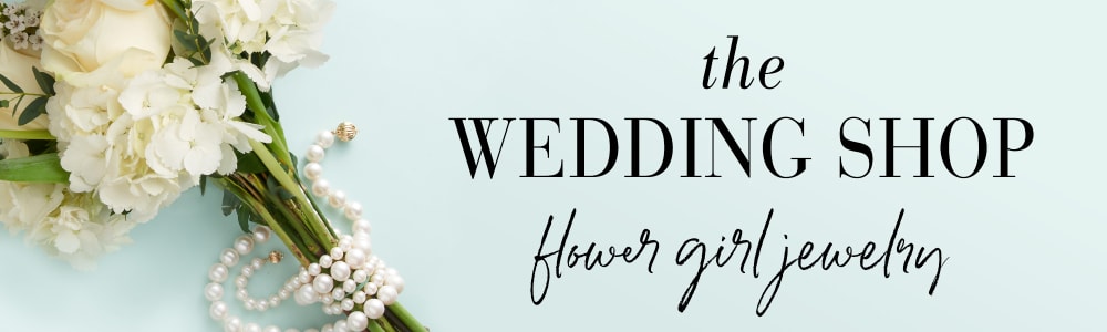 Bridal Flower Girl The Wedding Shop -- Flower Girl Jewelry. Image of flowers wrapped with pearl strands.Gifts