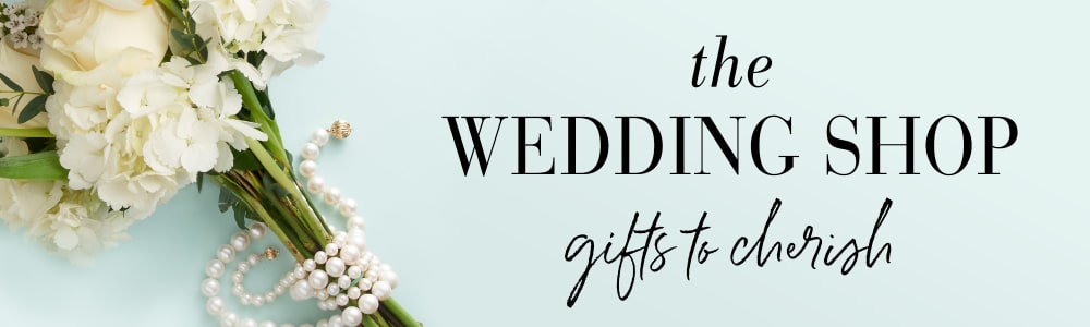 The Wedding Shop -- Gifts to Cherish. Image of flowers wrapped with pearl strands.