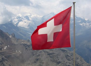Swiss Flag Bank turned down for Swiss bank programme agrees tax-evasion NPA