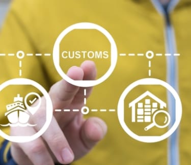 Person touching customs on a screen