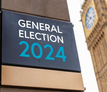 Parliament and a plaque with General Election General Election 2024 on it.