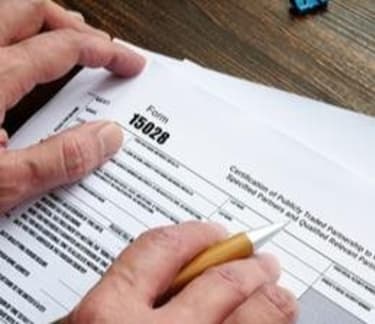 Person filling a document