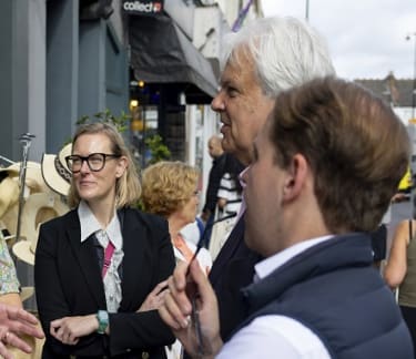 Richard Burge talking in the street