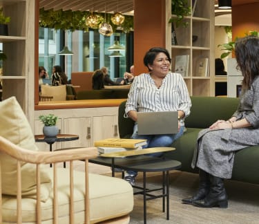 Two women working at Landmark Hotel Workspace