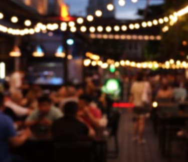 Photo of outside of a veuve with people