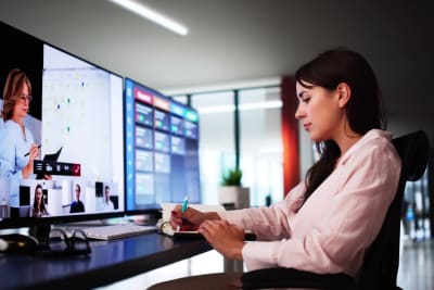 Woman watching a webinar