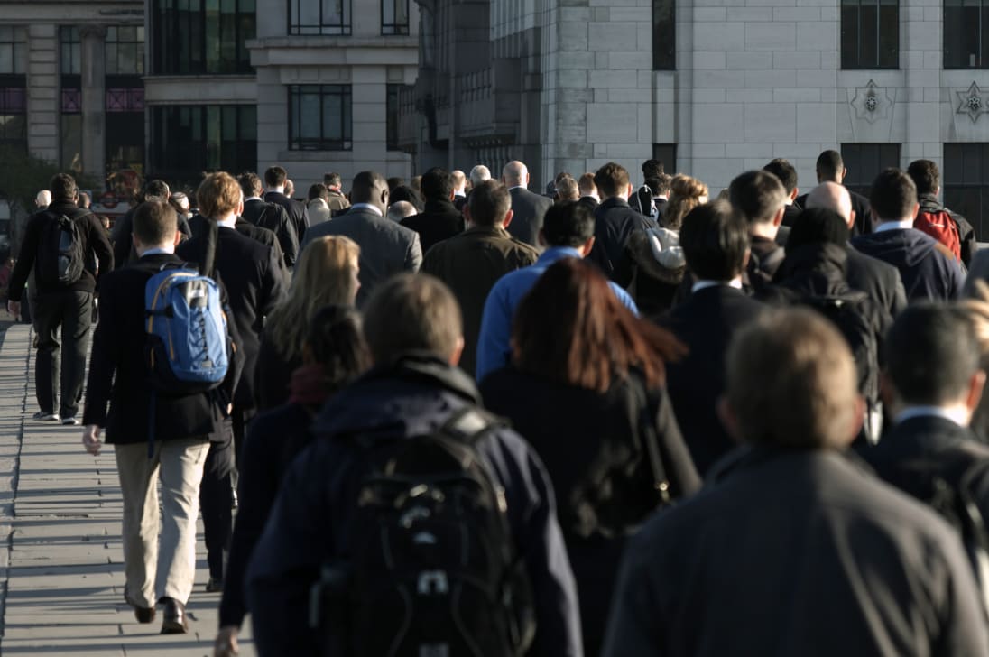 People commuting to work in London