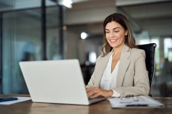 Woman looking at a laptop