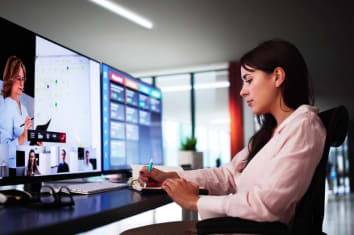 Woman watching a webinar