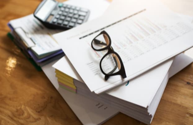 Glasses on top of documents