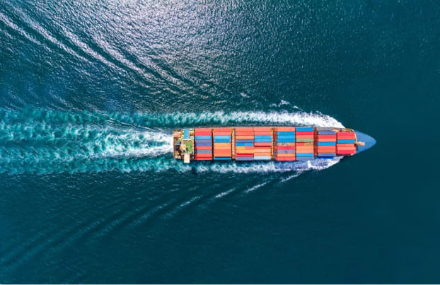 Cargo ship with containers in the sea