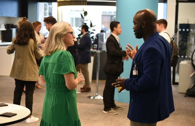 Two people at a networking event