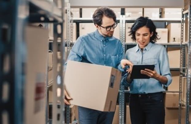 warehouse-workers-checking-packages