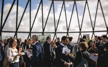 People networking at the Gherkin