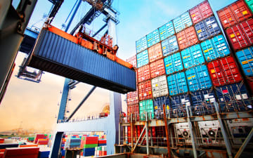 Containers being lifted and other containers in the background