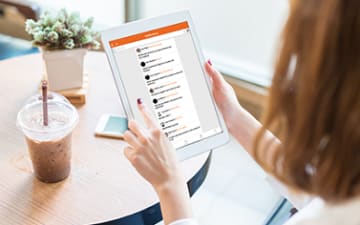 Woman using LCCI app on a tablet