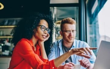 Two people working together