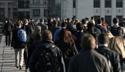 People commuting to work in London