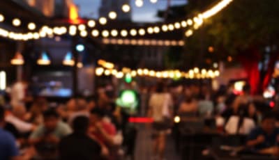 Photo of outside of a veuve with people