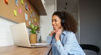 Woman looking at a laptop