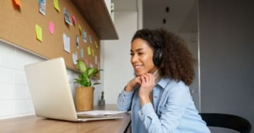 Woman looking at a laptop