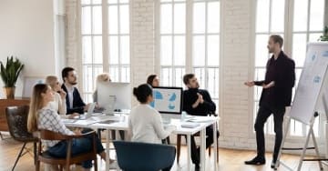 Man presenting at a meeting
