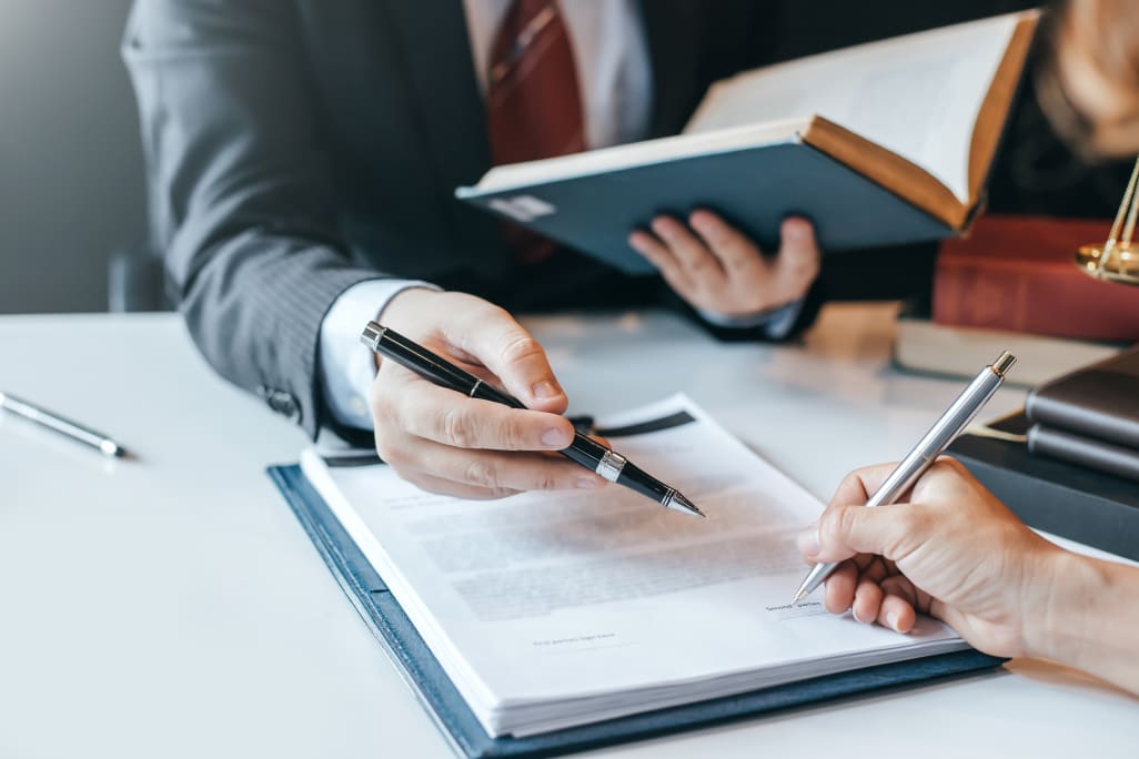 Man signing documents