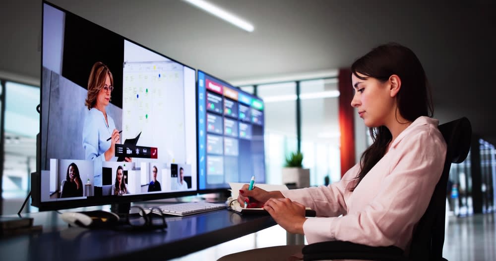 Woman watching a webinar