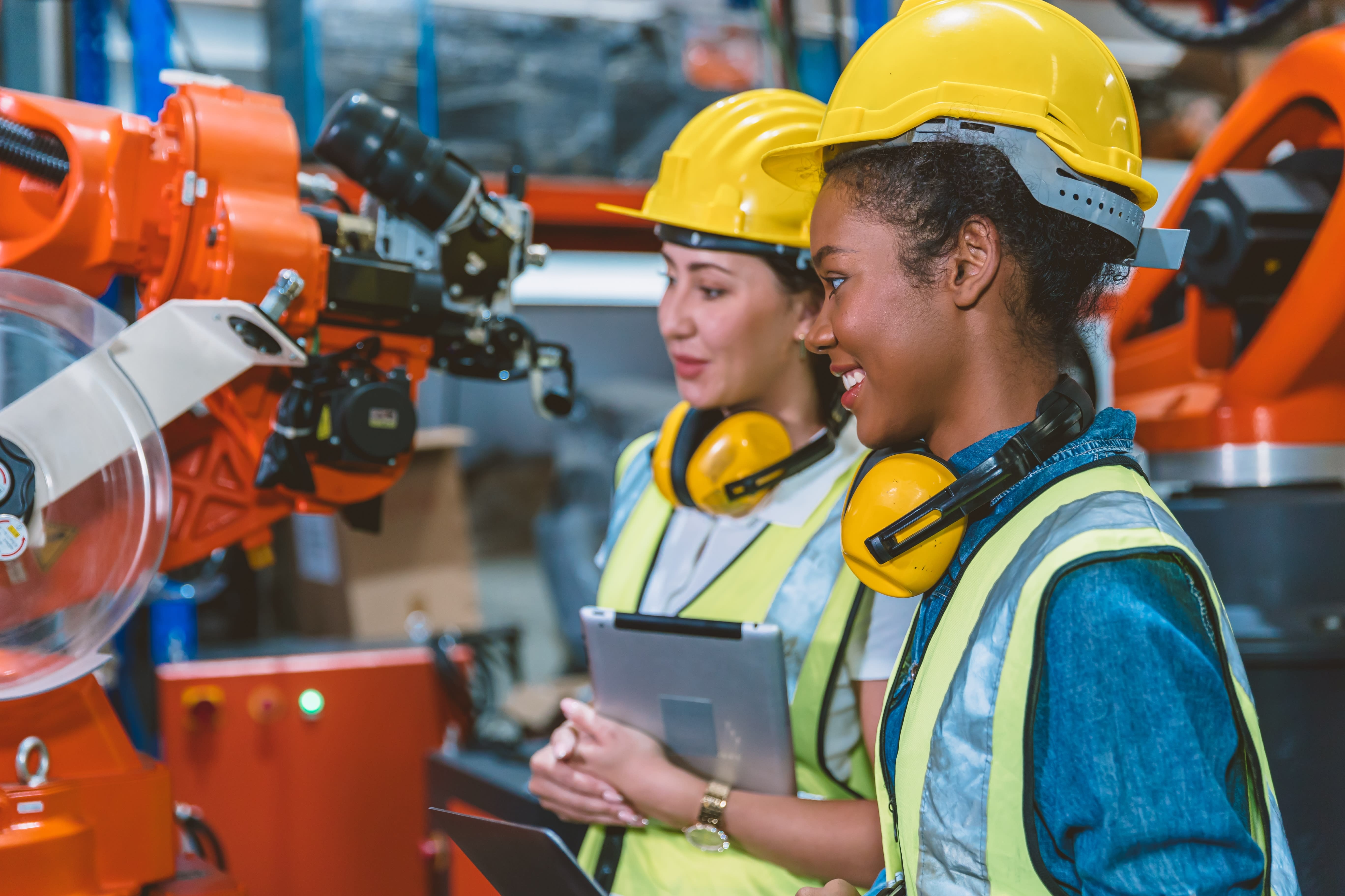 Two women working in a factory