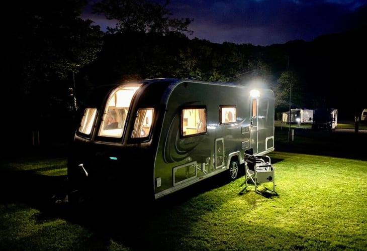 Caravan Lit Up at Night Camping