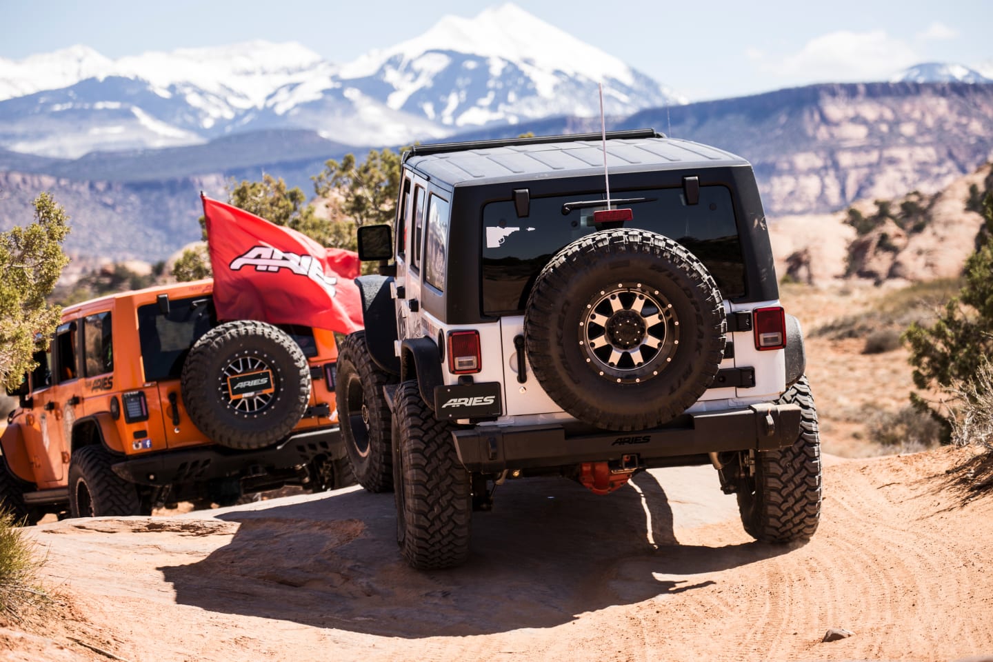 Two Jeeps off-roading with ARIES equipment