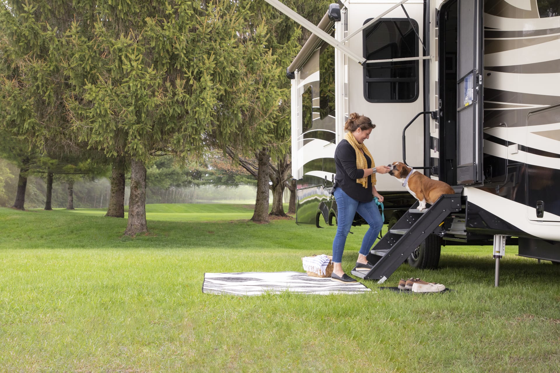 RV Steps Woman with Dog Camping