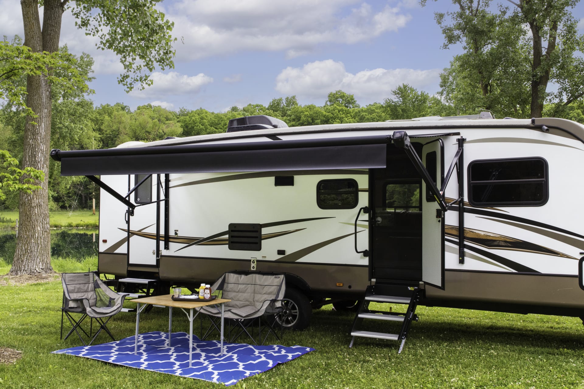 RV Patio with Awning, Chairs, Table Steps