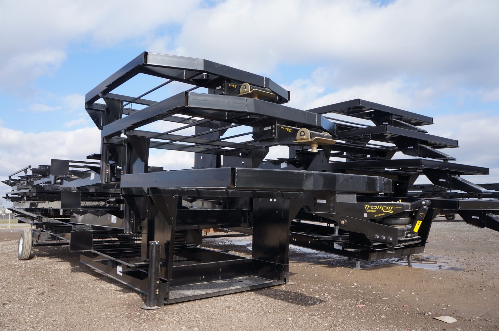 Stack of towable chassis at the Lippert chassis manufacturing plant