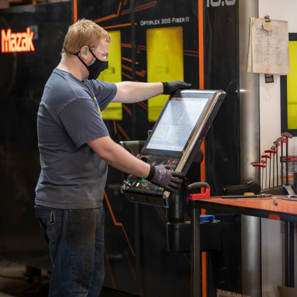 Team Member Working at Lippert Metal Fabrication Manufacturing Plant