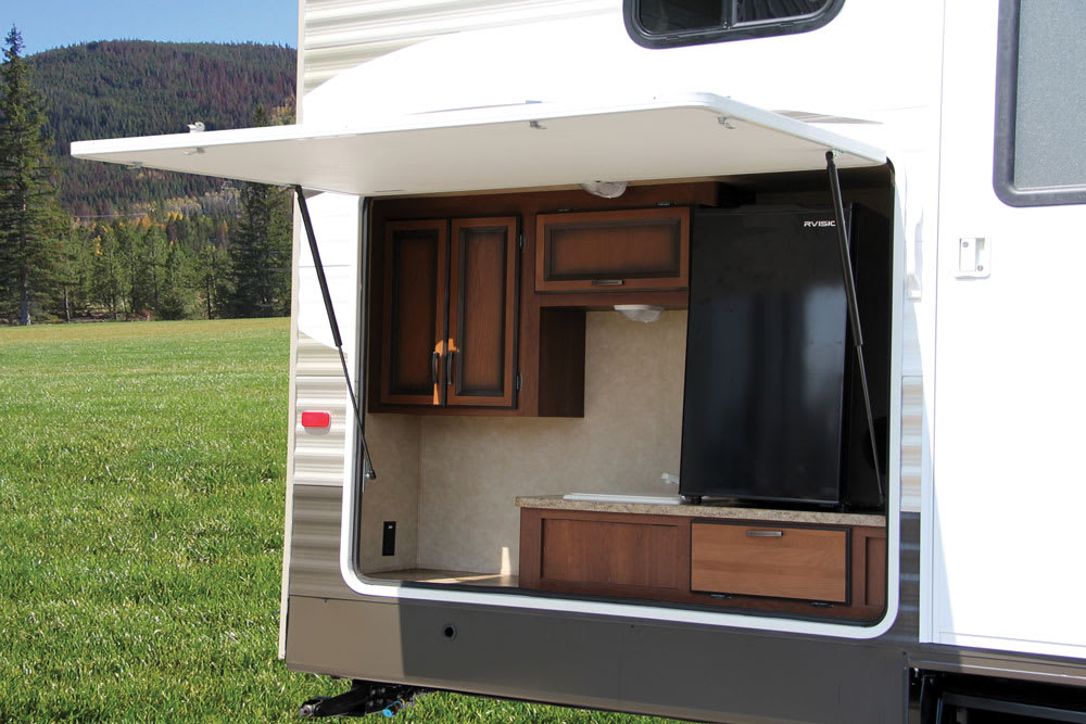 Exterior kitchen door on the back of an RV