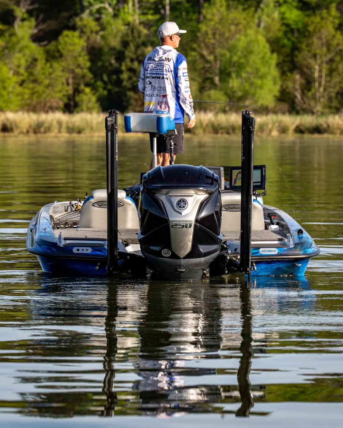 Lewmar Axis electric shallow water anchor on Darold Gleason's bass boat transom — sealed 12V motor, no hydraulic pump or hoses