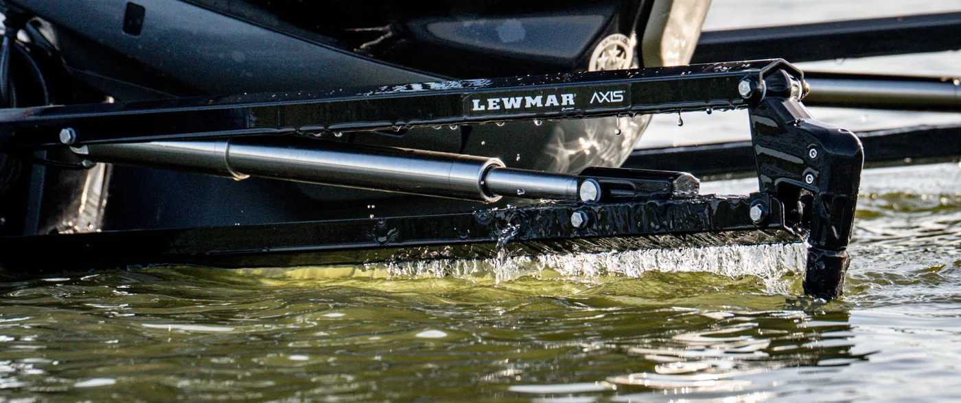 Wide view of Darold Gleason's bass boat pinned on a reservoir point with a Lewmar Axis electric shallow water anchor deployed off the transom