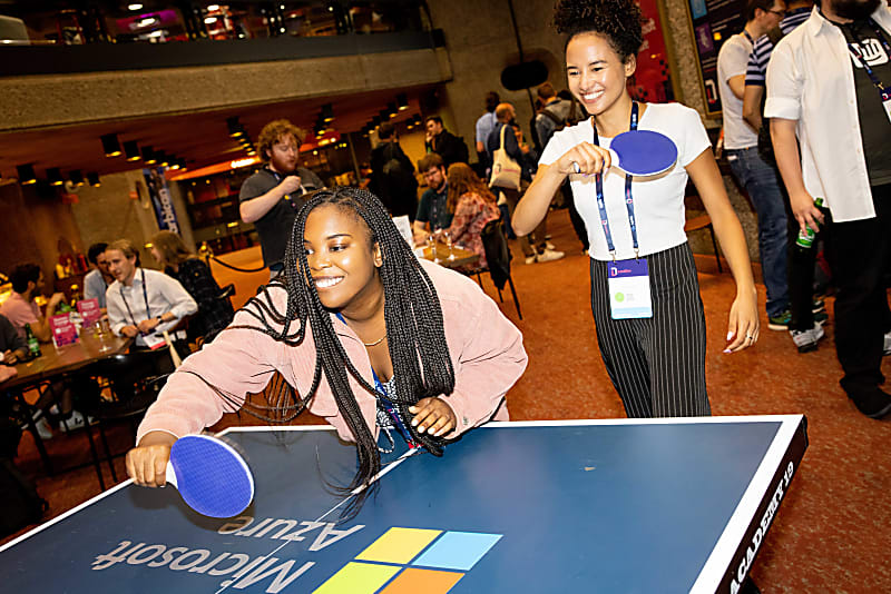 Two speakers playing table tennis at LeadDev London