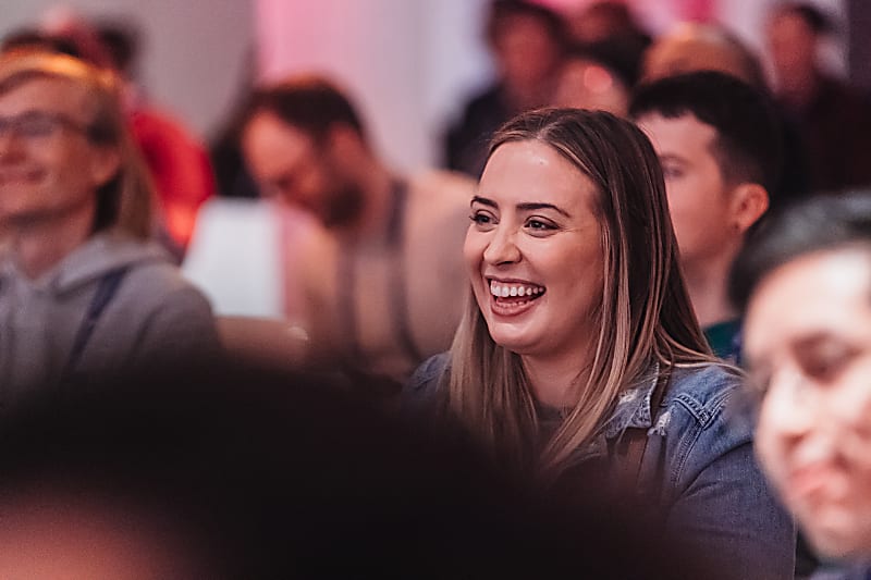 Audience members laughing while watching LeadDev New York 23