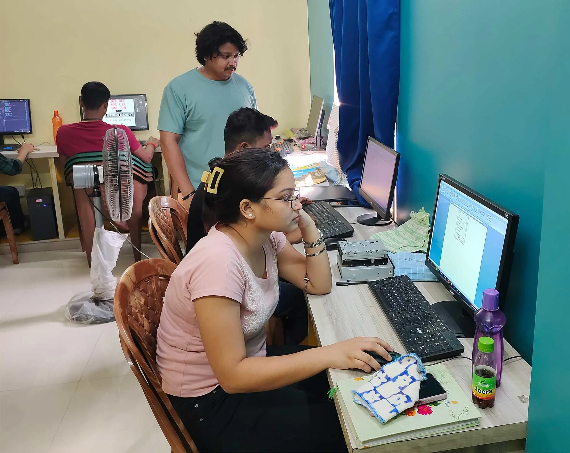 A student of Learn Computer Academy working on her portfolio
