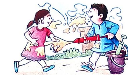 A boy aims a red pichkari at a girl, spraying colored water. The girl, wearing a pink dress, has yellow splashes on her clothes and appears to be reacting to the spray. A bucket with a green pichkari stands next to the boy.