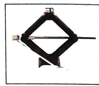 A black metal scissor jack, constructed from four angled arms forming a diamond shape, is centrally positioned. A threaded rod runs horizontally through the mechanism, connecting opposing vertices. The jack has a dark base.
