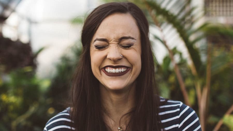 Woman smiling with fine expression lines treated by botulinum toxin (BT)