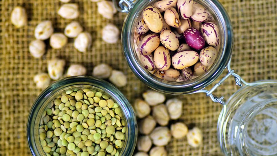 quail beans, legumes, lentils in glass jars