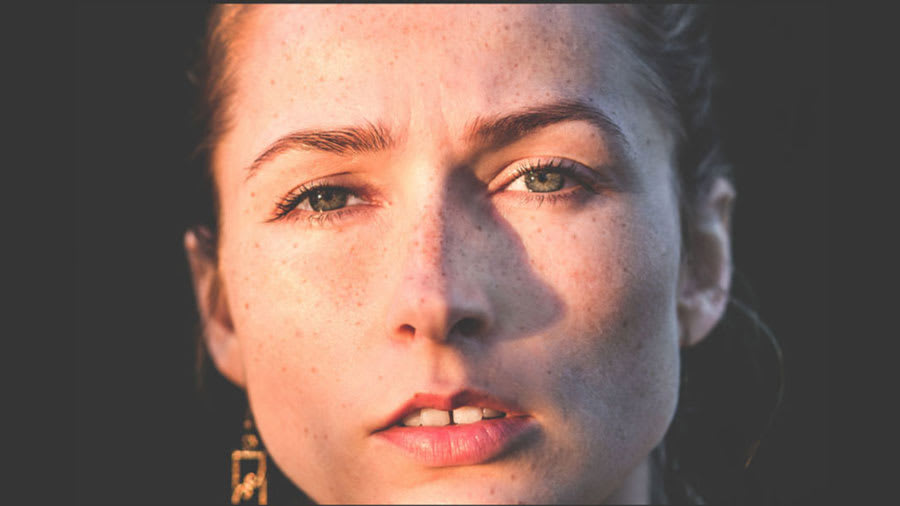 Woman's face with freckles