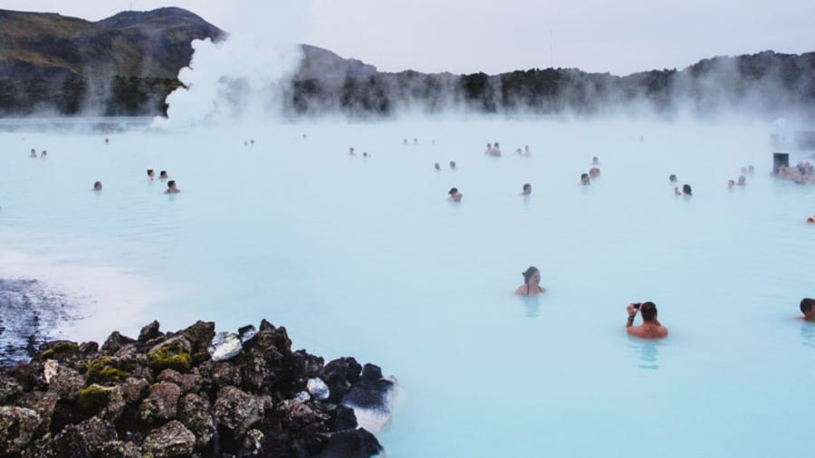 people-swimming-in-therapeutic-hot-spring-900.jpg