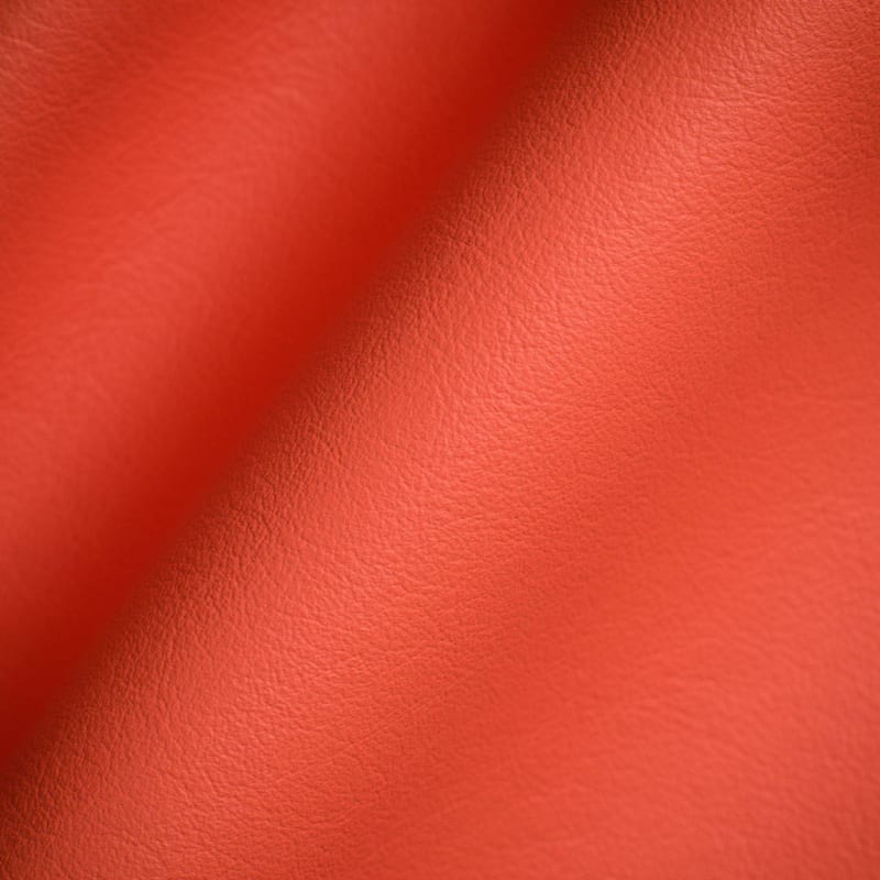 Colorful leather protected matte finish Close-up of Mango colorful leather showing the protected matte finish and fine pebble grain