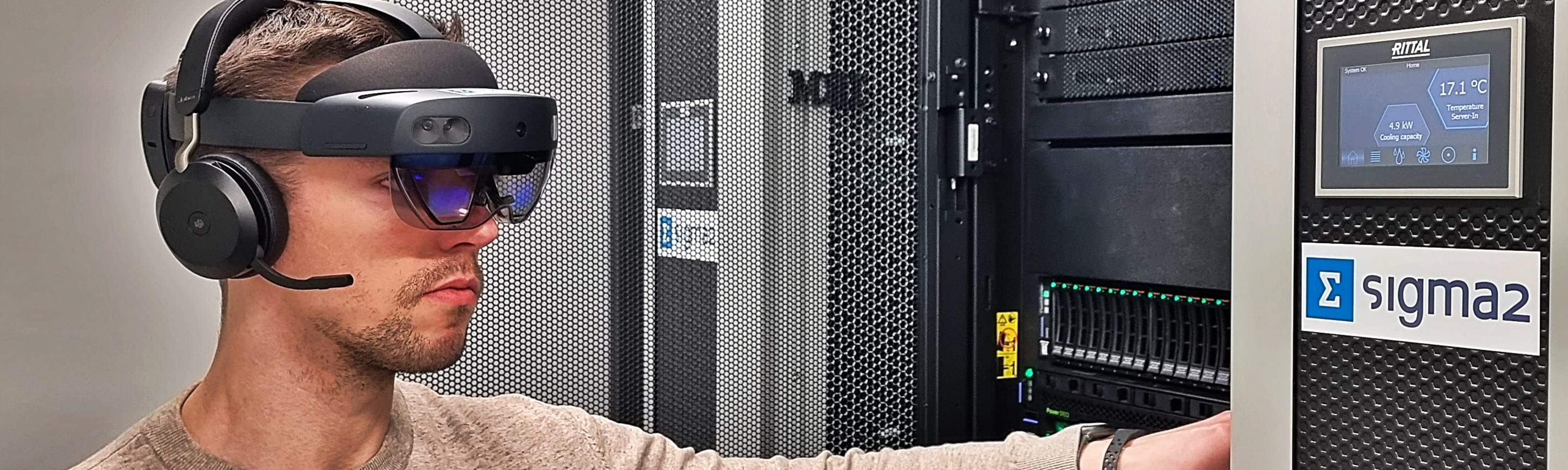 Technician in front of a supercomputer